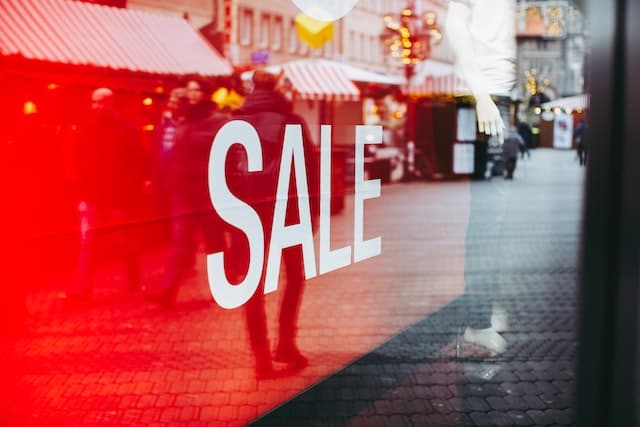 Sale window with reflections